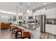Stylish kitchen featuring stainless steel appliances, a spacious island, and an open view of the living area at 1342 Galloway Rd # 132, Charlotte, NC 28262