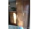 Bedroom with dresser and tall oak cabinet at 140 Landlubber Trl # H73, Mount Gilead, NC 27306