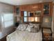 Main bedroom with wood floors and a queen bed at 140 Landlubber Trl # H73, Mount Gilead, NC 27306