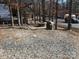 Stone fire pit with brick border and paver patio at 140 Landlubber Trl # H73, Mount Gilead, NC 27306