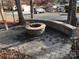 Stone fire pit with brick border and paver patio at 140 Landlubber Trl # H73, Mount Gilead, NC 27306