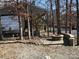Stone fire pit with brick border and paver patio at 140 Landlubber Trl # H73, Mount Gilead, NC 27306