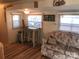 Cozy living room features a sofa and small table at 140 Landlubber Trl # H73, Mount Gilead, NC 27306