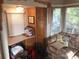 Living room features a desk, couch, and window at 140 Landlubber Trl # H73, Mount Gilead, NC 27306
