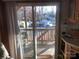 Sliding glass door opens to a deck overlooking the woods at 140 Landlubber Trl # H73, Mount Gilead, NC 27306