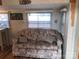 Relaxing sofa in the living room with lake decor at 140 Landlubber Trl # H73, Mount Gilead, NC 27306