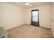 Simple bedroom with ceiling fan and carpet flooring at 185 Altondale Dr, Statesville, NC 28625