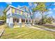 Renovated blue house with white columns and a porch at 213 N Congress St, York, SC 29745