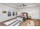 Spacious primary bedroom with wood floors and neutral decor at 2517 Lydia Ave, Charlotte, NC 28205