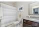 Small bathroom with a toilet, vanity, and shower at 26061 Appleyard Ct, Lancaster, SC 29720