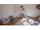 bedroom with a low bed, toys, and plenty of natural light at 300 Pine Meadows Cir, Hickory, NC 28601