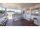 Covered deck with outdoor seating area and a view of the backyard at 300 Pine Meadows Cir, Hickory, NC 28601