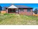 Charming brick home with a well-maintained lawn and cozy front porch at 300 Pine Meadows Cir, Hickory, NC 28601
