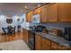 Kitchen features granite counters and wood cabinets at 300 Pine Meadows Cir, Hickory, NC 28601