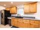 Updated kitchen with oak cabinets, granite countertops, and stainless steel dishwasher at 300 Pine Meadows Cir, Hickory, NC 28601