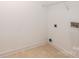 A simple, utilitarian laundry room with connections and space for appliances at 300 Pine Meadows Cir, Hickory, NC 28601
