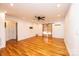 Inviting living room features ceiling fan, hardwood flooring, and is painted with neutral color scheme at 300 Pine Meadows Cir, Hickory, NC 28601