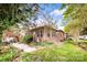 Charming brick home with meticulously maintained backyard and lush landscaping at 3024 Kern Dr, Salisbury, NC 28147