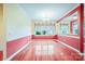 Dining room with hardwood floors, large windows, and neutral walls at 3024 Kern Dr, Salisbury, NC 28147