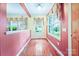 Dining room featuring hardwood floors, trimmed windows, and neutral walls at 3024 Kern Dr, Salisbury, NC 28147