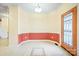 Bright entryway with patterned tile, stained glass door, and neutral walls accented with red trim at 3024 Kern Dr, Salisbury, NC 28147
