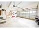 Spacious two car garage with an insulated garage door and durable epoxy floor coating at 3024 Kern Dr, Salisbury, NC 28147