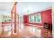 Open living room layout featuring hardwood floors and large windows at 3024 Kern Dr, Salisbury, NC 28147