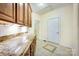 Pantry area with granite countertops and ample cabinet space for storage at 3024 Kern Dr, Salisbury, NC 28147