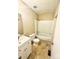 Bathroom with white tub, toilet and vanity at 3959 Briarhill Dr, Charlotte, NC 28215