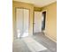 Bright bedroom with carpet flooring and a double-door closet at 3959 Briarhill Dr, Charlotte, NC 28215