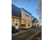 Two-story yellow home with gray roof, multiple units shown at 3959 Briarhill Dr, Charlotte, NC 28215