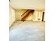 Living room with carpeted floors and wooden staircase at 3959 Briarhill Dr, Charlotte, NC 28215