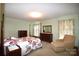 Main bedroom with four-poster bed and plenty of space at 412 Princeton Dr, Salisbury, NC 28144