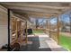 A large wooden deck with open and screened-in sections, suitable for exercise equipment or relaxing at 443 Picadilly Ln, Troutman, NC 28166