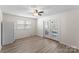Bright dining area featuring a ceiling fan and access to outdoor patio at 443 Picadilly Ln, Troutman, NC 28166