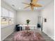 Bright office space with a large window, desk, and ceiling fan, perfect for working from home at 443 Picadilly Ln, Troutman, NC 28166