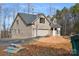 Exterior view of the house showing brick facade, garage, driveway and landscaping potential at 5230 Club View Dr, Concord, NC 28025