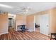 Spacious bedroom with hardwood floors and an office workspace at 5702 Prescott Ct, Charlotte, NC 28269