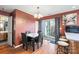 Charming dining area with a small table and access to a patio at 5702 Prescott Ct, Charlotte, NC 28269
