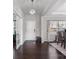 Foyer with hardwood floors, and view of dining room at 7070 Founders Way, Harrisburg, NC 28075