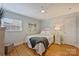 Cozy bedroom with warm decor and neutral furniture at 7135 Folger Dr, Charlotte, NC 28270
