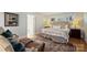 Inviting bedroom with neutral decor, wood floors, and bright natural light at 7135 Folger Dr, Charlotte, NC 28270