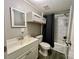 Bathroom with tub, shower, vanity, and linen cabinet at 758 Shannon Meadows Rd, Clover, SC 29710