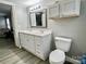 Double vanity bathroom with a toilet and built-in storage at 758 Shannon Meadows Rd, Clover, SC 29710