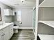 Bathroom with shower, toilet, vanity, and linen storage at 758 Shannon Meadows Rd, Clover, SC 29710