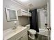 Bathroom with tub, shower, vanity, and linen cabinet at 758A Shannon Meadows Rd # 13, Clover, SC 29710