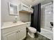Bathroom with tub, shower, vanity, and linen cabinet at 758 Shannon Meadows Rd, Clover, SC 29710