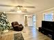 Comfortable living room with sectional sofa, recliner, and a view of the entryway at 758 Shannon Meadows Rd, Clover, SC 29710