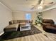 Relaxing living room with sectional sofa, recliner, and Christmas tree at 758 Shannon Meadows Rd, Clover, SC 29710