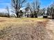 Large grassy yard with scattered leaves at 758 Shannon Meadows Rd, Clover, SC 29710